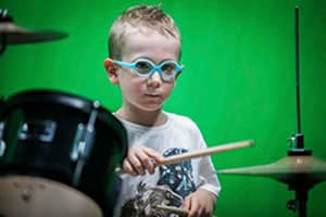 Miko Moon in childhood during his musical beginnings.