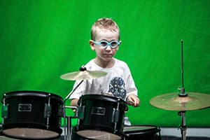 Miko Moon in childhood during his musical beginnings.
