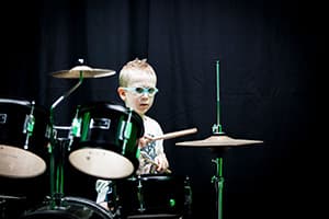 Miko Moon in childhood during his musical beginnings.