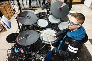 Miko Moon in childhood during his musical beginnings.