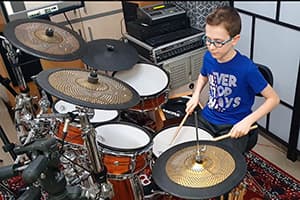 Miko Moon in childhood during his musical beginnings.
