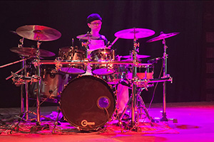 Miko Moon during a performance on stage.