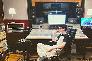 Miko Moon in the control room while listening to a recording