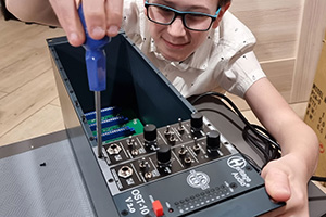 Miko Moon installs preamps in the 500 system in a recording studio