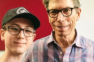 John Riley and Miko Moon in a souvenir photo after a lesson, 2022