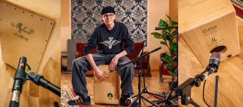 Miko Moon playing a cajon.