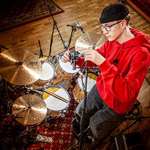 A miked drum kit ready for recording in the studio.