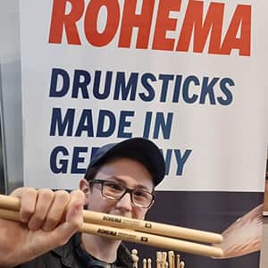 Miko Moon presenting Rohema drumsticks.