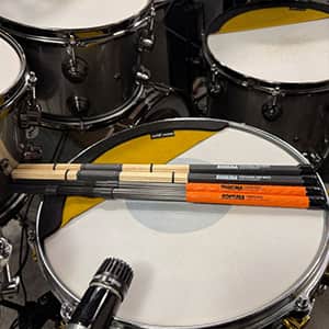 Miko Moon holding Rohema drumsticks.