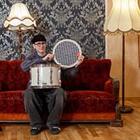 Miko Moon sits with a snare drum and a damping element.