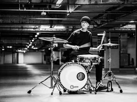 Miko Moon playing drums